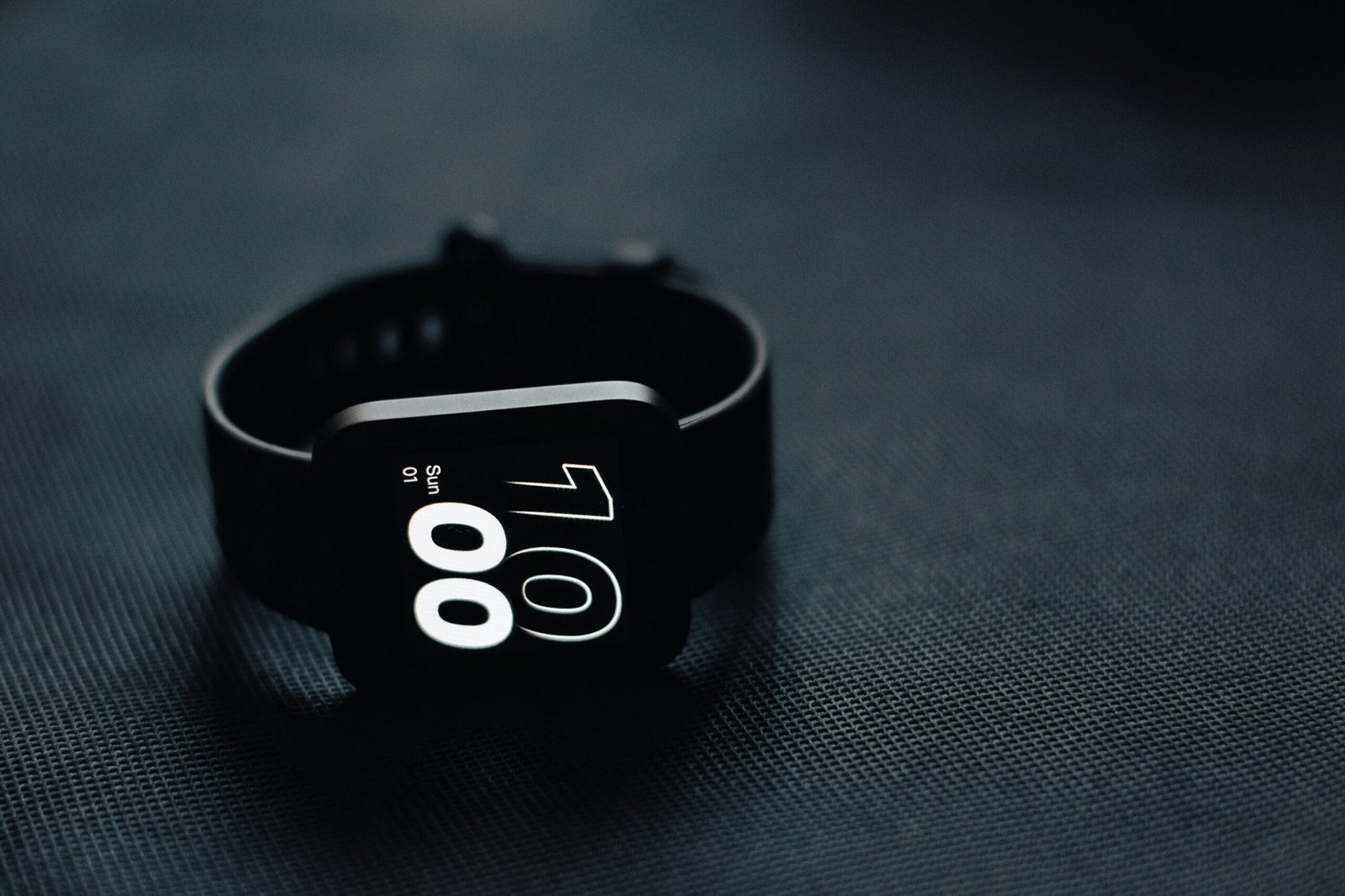 a close up of a watch on a table